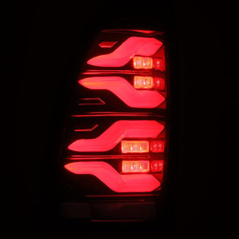 AlphaRex 05-15 Toyota Tacoma LUXX LED Taillights Blk/Red w/Activ Light/Seq Signal - 680070
