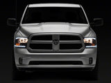 Raxiom 09-18 Dodge RAM 1500/2500/3500 Axial Series Headlights w/ LED Bar- Blk Housing (Clear Lens) - R131481