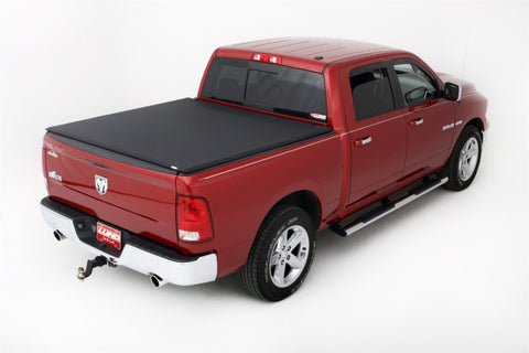 Lund 02-17 Dodge Ram 1500 (5.5ft. Bed) Genesis Elite Tri-Fold Tonneau Cover - Black - 95865