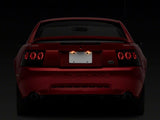 Raxiom 99-04 Ford Mustang Axial Series Altezza Style Tail Lights- Blk Housing (Smoked Lens) - 413422