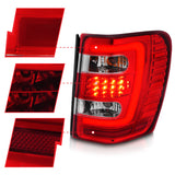 ANZO 1999-2004 Jeep Grand Cherokee LED Tail Lights w/ Light Bar Chrome Housing Red/Clear Lens - 311396