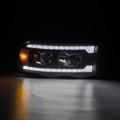 AlphaRex 02-05 Dodge Ram 1500 LUXX LED Proj Headlights Plank Style Black w/Activ Light/Seq Signal - 880567