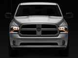 Raxiom 09-18 Dodge RAM 1500/2500/3500 Axial Headlights w/ SEQL LED Bar- Blk Housing (Clear Lens) - R131482