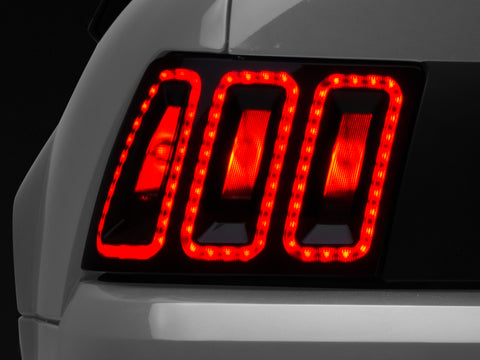 Raxiom 99-04 Ford Mustang Excluding 99-01 Cobra Icon LED Tail Lights- Black Housing (Smoked Lens) - 100807
