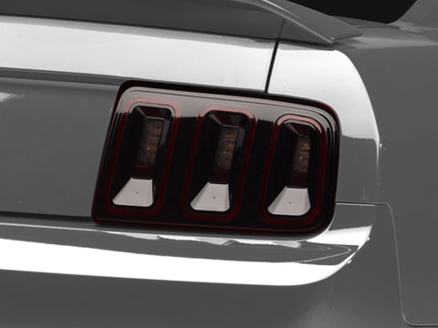 Raxiom 05-09 Ford Mustang Gen5 Tail Lights- Black Housing (Smoked Lens) - 49169