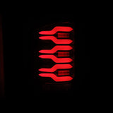 AlphaRex 14-18 GMC Sierra 1500/2500HD/3500HD LUXX-Series LED Tail Lights Blk/Red w/Actv Lgt Seq. Sig - 630050
