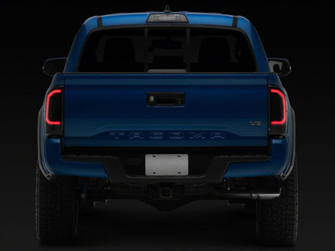 Raxiom 16-23 Toyota Tacoma Axial Series LED Tail Lights- Black Housing- Smoked Lens - TT36288