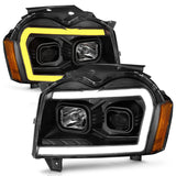 ANZO 2005-2007 Jeep Grand Cherokee Projector Headlights w/ Light Bar Switchback Black Housing - 111543