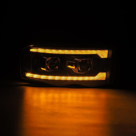 AlphaRex 02-05 Dodge Ram 1500 PRO-Series Projector Headlights Plank Style Black w/Seq Signal - 880570