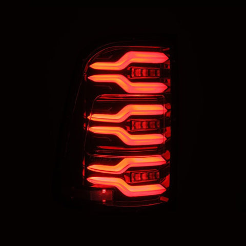 AlphaRex 19-21 Dodge Ram 1500 Luxx-Series LED Tail Lights Alpha-Black w/Activ Light/Seq Signal - 640030