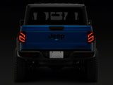 Raxiom 20-23 Jeep Gladiator JT Axial Series LED Tail Lights- Blk Housing (Smoked Lens) - JG18584