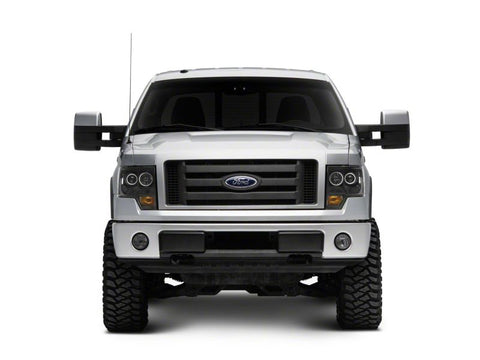 Raxiom 09-14 Ford F-150 Super White LED Halo Projector Headlights- Blk Housing (Clear Lens) - T542825