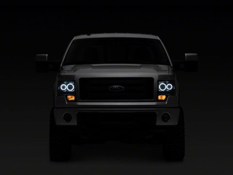 Raxiom 09-14 Ford F-150 Super White LED Halo Projector Headlights- Blk Housing (Clear Lens) - T542825