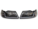 Raxiom 99-04 Ford Mustang Axial Series Headlights w/ Sequential LED Bar- Blk Housing (Clear Lens) - 422713