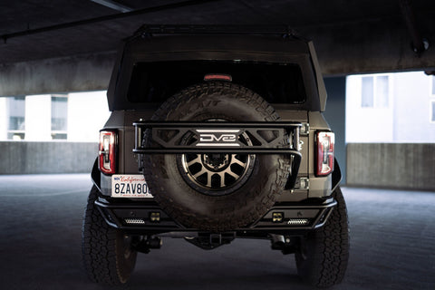 DV8 Offroad 21-23 Ford Bronco Spare Tire Guard & Accessory Mount - TCBR-01