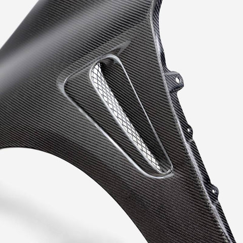 Seibon 2023 Toyota GR Corolla OE-Style Dry Carbon Fenders - FF23TYGRCOR-OE-DRY