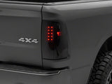 Raxiom 09-18 Dodge RAM 1500/2500/3500 Axial Series LED Tail Lights- BlkHousing- SmokedLens - R131283