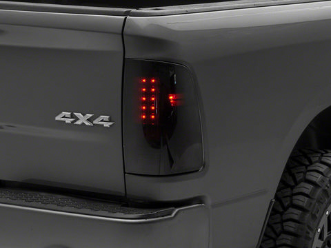 Raxiom 09-18 Dodge RAM 1500/2500/3500 Axial Series LED Tail Lights- BlkHousing- SmokedLens - R131283