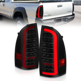 ANZO 05-15 Toyota Tacoma Full LED Tail Lights w/Light Bar Sequential Black Housing Smoke Lens - 311428