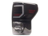 Raxiom 07-13 Toyota Tundra Axial Series Dual C-Shape LED Tail Lights- Black Housing- Smoked Lens - TU9917