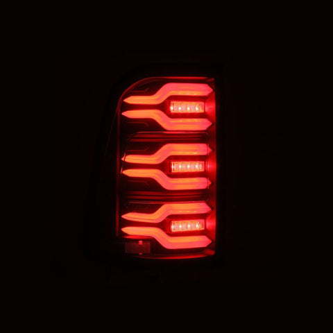 AlphaRex 19-21 Dodge Ram 1500 Luxx-Series LED Tail Lights Black w/Activ Light/Seq Signal - 640040