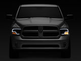 Raxiom 09-18 RAM 1500 LED Halo Projector Headlights- Black Housing (Clear Lens) - R111516