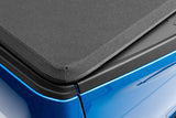 Lund 04-14 Ford F-150 (5.5ft. Bed) Genesis Elite Tri-Fold Tonneau Cover - Black - 95872