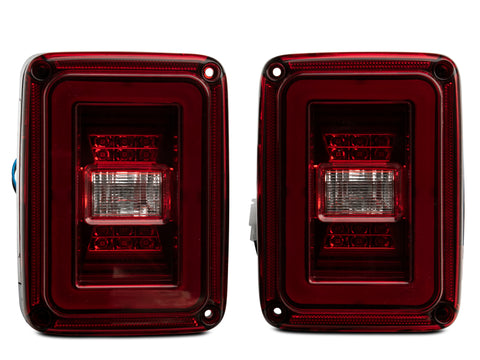 Raxiom 07-18 Jeep Wrangler JK JL Style LED Tail Lights- Black Housing - Red Lens - J133626