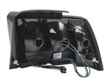 Raxiom 99-04 Ford Mustang Excluding 99-01 Cobra Icon LED Tail Lights- Black Housing (Smoked Lens) - 100807