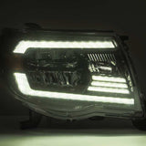 AlphaRex 05-11 Toyota Tacoma LUXX Crystal Headlights Plank Style Design Black w/Activation Light/DRL - 880735