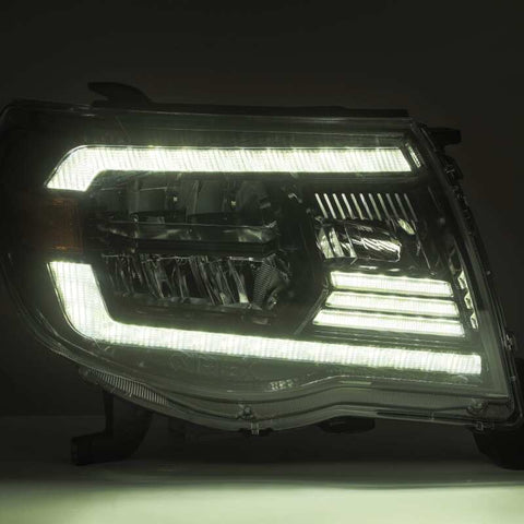 AlphaRex 05-11 Toyota Tacoma LUXX Crystal Headlights Plank Style Alpha Black w/Activation Light/DRL - 880733
