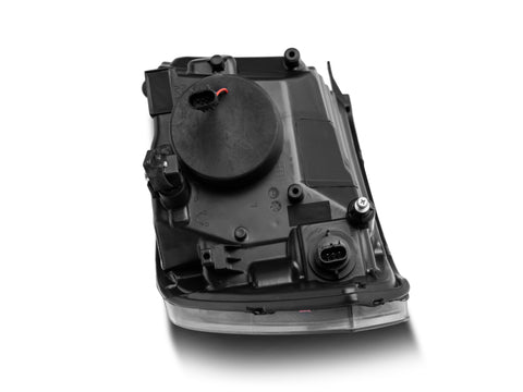 Raxiom 09-18 RAM 1500 Super White LED Halo Projector Headlights- Black Housing (Clear Lens) - R110150