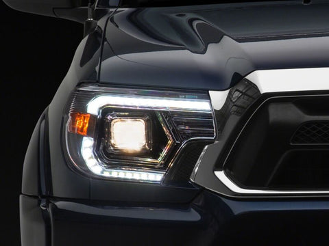 Raxiom 12-15 Toyota Tacoma Axial Series Switchback Projector Headlights- Chrome- Clear Lens - TT23360