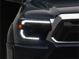 Raxiom 12-15 Toyota Tacoma Axial Series Switchback Projector Headlights- Black Housing- Clear Lens - TT23359