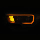 ANZO 2016-2017 Toyota Tacoma Projector Headlights w/ Plank Style Switchback Black w/ Amber - 111396