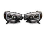 Raxiom 12-15 Toyota Tacoma Axial Series Projector Headlights w/ LED Bar- Blk Housing (Clear Lens) - TT21849