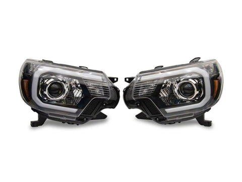 Raxiom 12-15 Toyota Tacoma Axial Series Projector Headlights w/ LED Bar- Blk Housing (Clear Lens) - TT21849