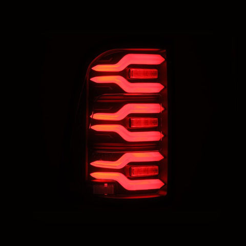 AlphaRex 19-21 Dodge Ram 1500 Luxx-Series LED Tail Lights Black w/Activ Light/Seq Signal - 640040