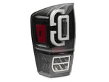 Raxiom 16-23 Toyota Tacoma XW Series Sequential LED Tail Lights- Black Housing- Clear Lens - TT30331