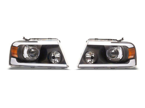 Raxiom 04-08 Ford F-150 Axial Series Projector Headlights with LED Bar- Black Housing- Clear Lens - T566363