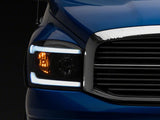 Raxiom 06-09 Dodge RAM 1500/2500/3500 Axial Headlights w/ SEQL LED Bar- Blk Housing (Clear Lens) - R131480