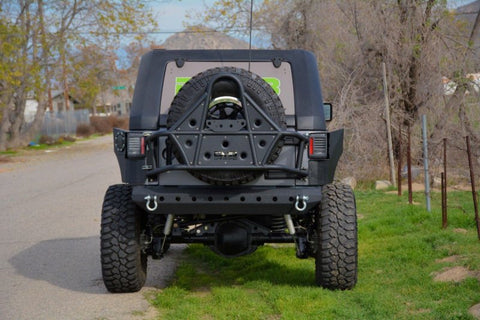 DV8 Offroad 07-18 Jeep Wrangler Body Mounted Tire Carrier - TCSTTB-01