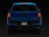 Raxiom 16-23 Toyota Tacoma XW Series Sequential LED Tail Lights- Black Housing- Red Lens - TT30332