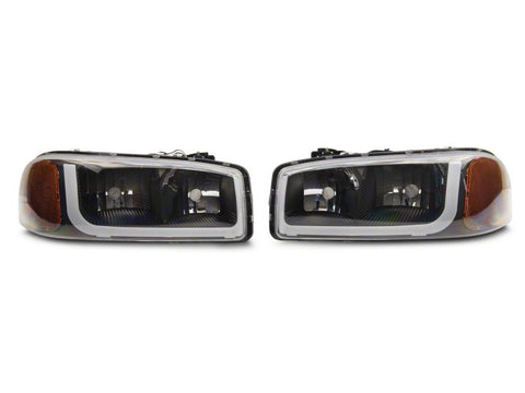 Raxiom 99-06 GMC Sierra 1500 Axial Series Headlights w/ LED Bar- Blk Housing (Clear Lens) - S531789