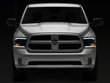 Raxiom 09-18 Dodge RAM 1500/2500/3500 Axial Headlights w/ SEQL LED Bar- Blk Housing (Clear Lens) - R131482