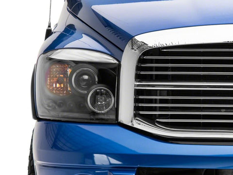 Raxiom 06-08 Dodge RAM 1500 LED Halo Projector Headlights- Blk Housing (Clear Lens) - R110149