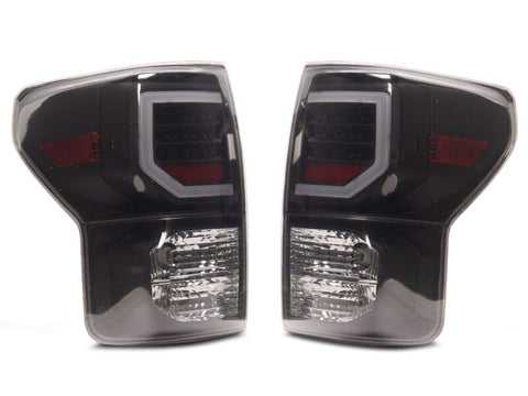 Raxiom 07-13 Toyota Tundra Axial Series Dual C-Shape LED Tail Lights- Black Housing- Smoked Lens - TU9917