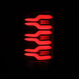 AlphaRex 14-18 GMC Sierra 1500/2500HD/3500HD LUXX-Series LED Tail Lights Blk w/Actv Light & Seq. Sig - 630040
