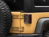 Raxiom 07-18 Jeep Wrangler JK Axial Series LED Halo Tail Lights- Black Housing (Dark Smoked Lens) - J138358