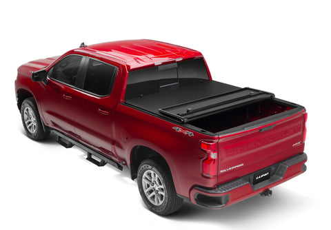 Lund 04-06 Chevy Silverado 1500 Fleetside (5.8ft. Bed) Hard Fold Tonneau Cover - Black - 969151